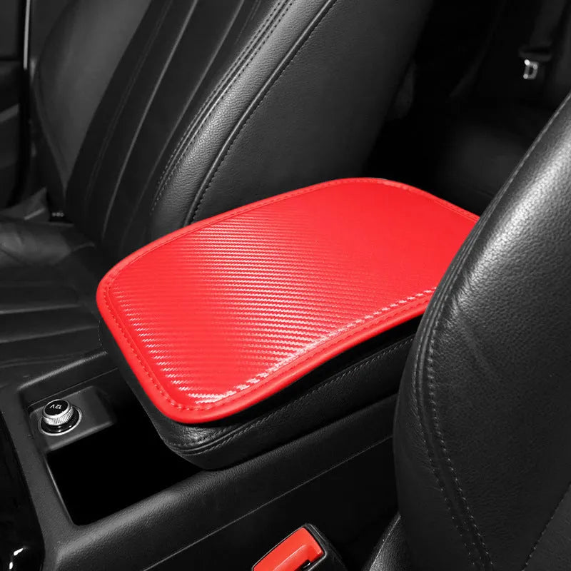 Leather automotive armrest box mat for car centre console protection.
