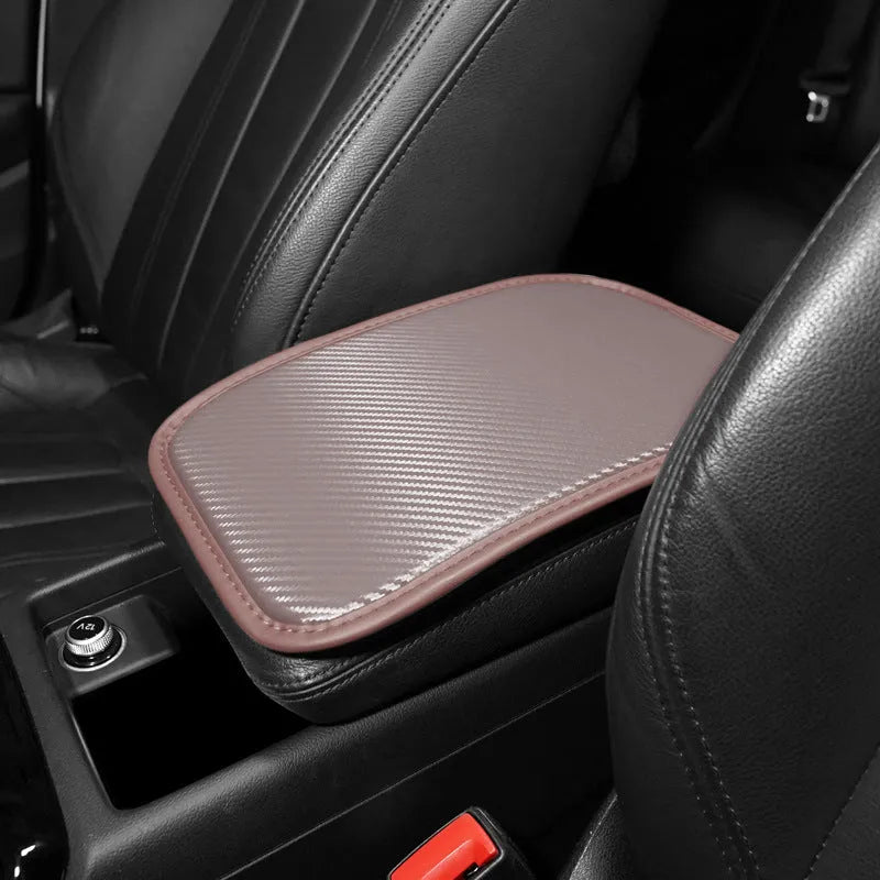 Leather automotive armrest box mat for car centre console protection.