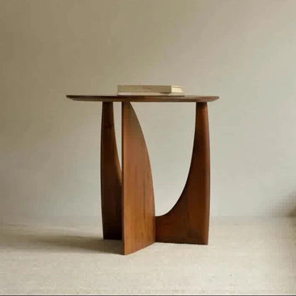Round solid wood bedside table with geometric legs in walnut finish measuring 50cm diameter
