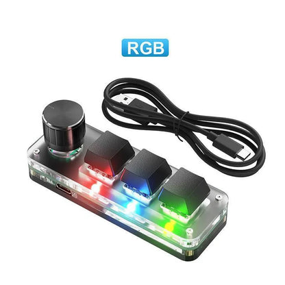 Black and white programmable mini keyboard with RGB backlight and copy/paste keys showing compact 15cm size