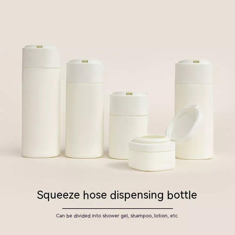 Travel portable filling set lotion bottle in white, pink, grey, and green