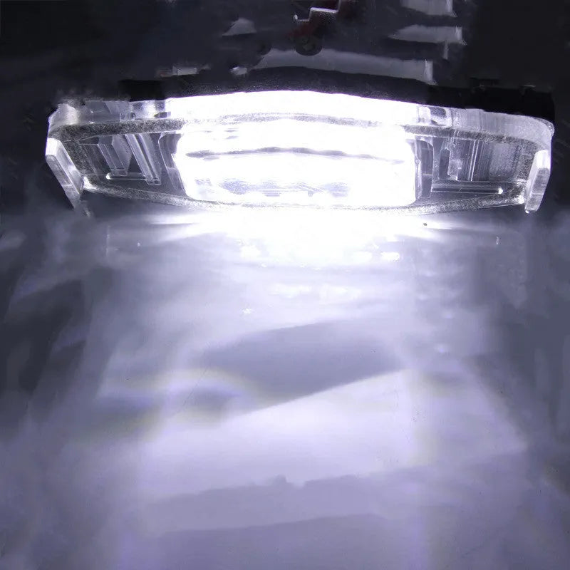 Minimalist white plastic LED licence plate light unit for CIVIC vehicles with cool white illumination