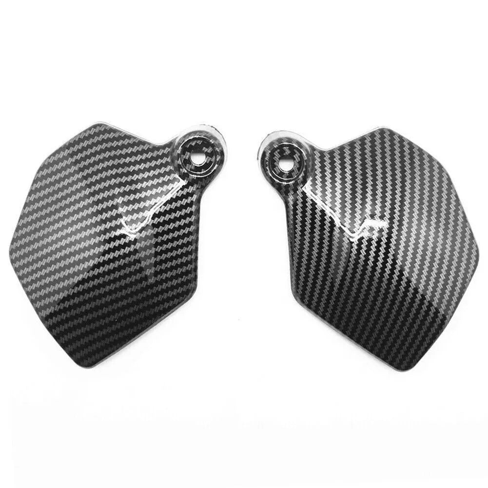 Pair of carbon fibre black ABS side upper frame fairing covers for Honda CBR1000RR motorcycle.