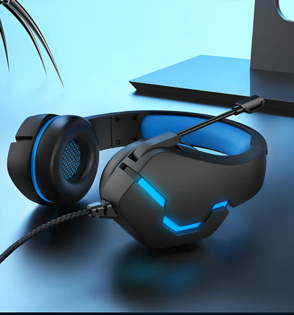J10 3.5mm wired gaming headset with mic, LED lights, soft PU earmuffs, and blue or red colour options