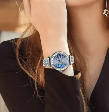 Women's waterproof quartz watch with steel belt, 11mm thick, in gold red, rose pink, or silver blue.