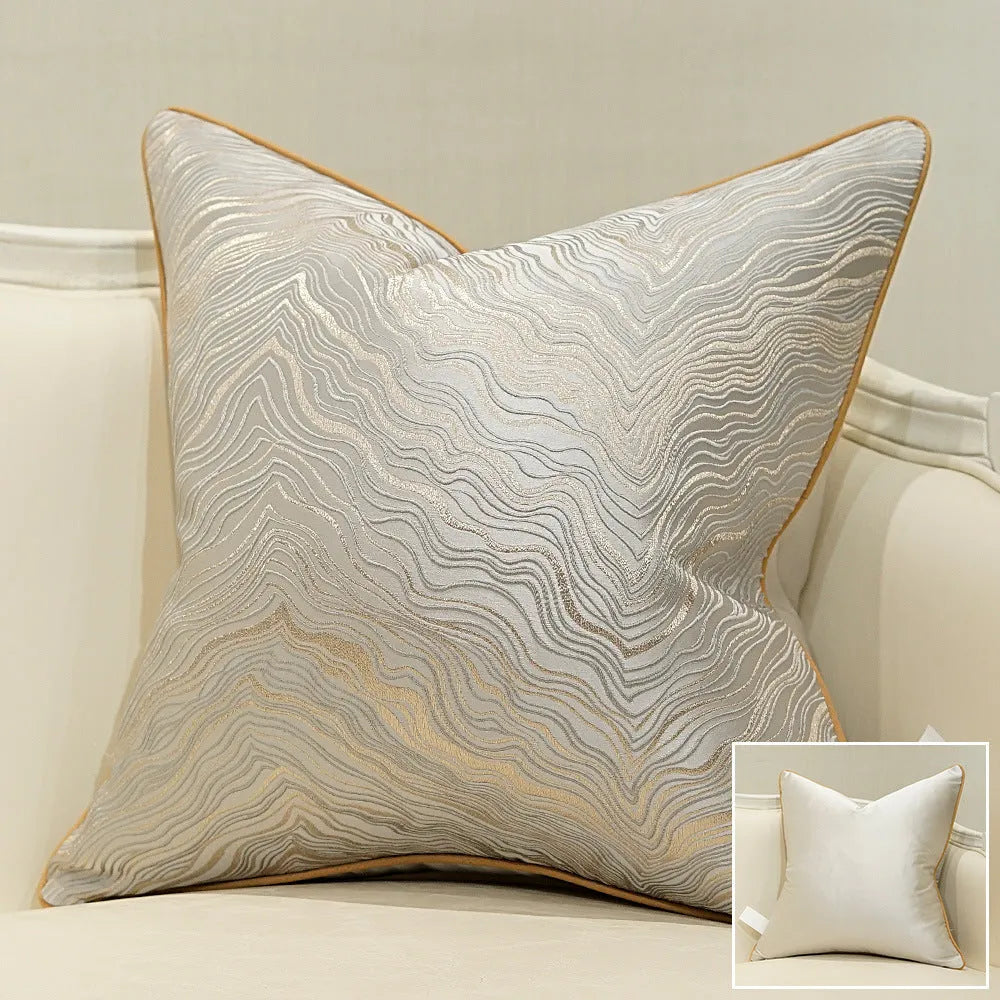 Corrugated stripe and diamond pattern cushion covers in green, blue, grey, and beige colours.