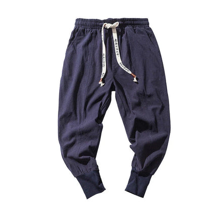 Men's harem trousers made of soft cotton and linen, featuring an elastic waistband and relaxed silhouette for all-day comfort.