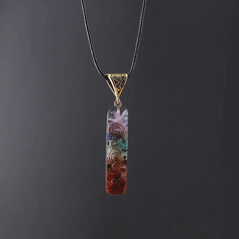 Handcrafted natural crystal seven chakra pendant with unique geometric design