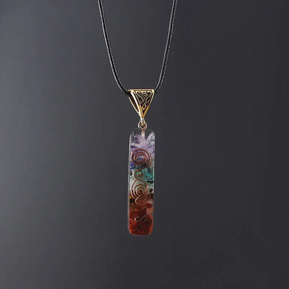 Handcrafted natural crystal seven chakra pendant with unique geometric design