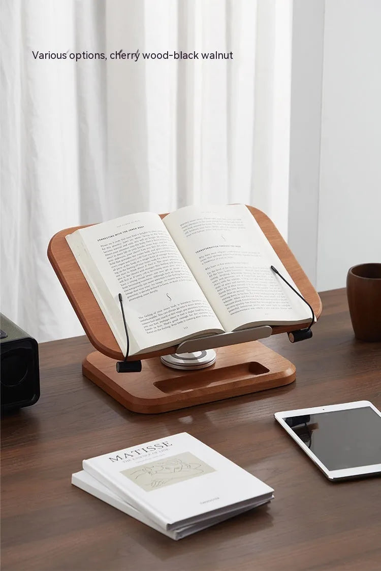 Walnut coloured solid wood adjustable reading rack with rotating base holding a book