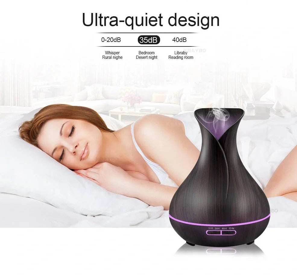 Black USB humidifier with colour-changing LED lights and water mist output