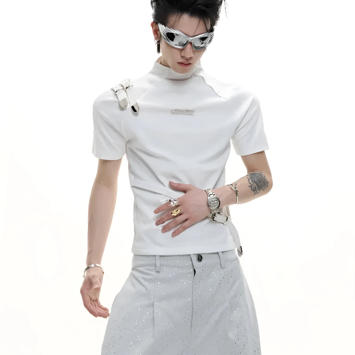 Men's black slim fit cotton t-shirt with metal belt design detail and contrast stitching.
