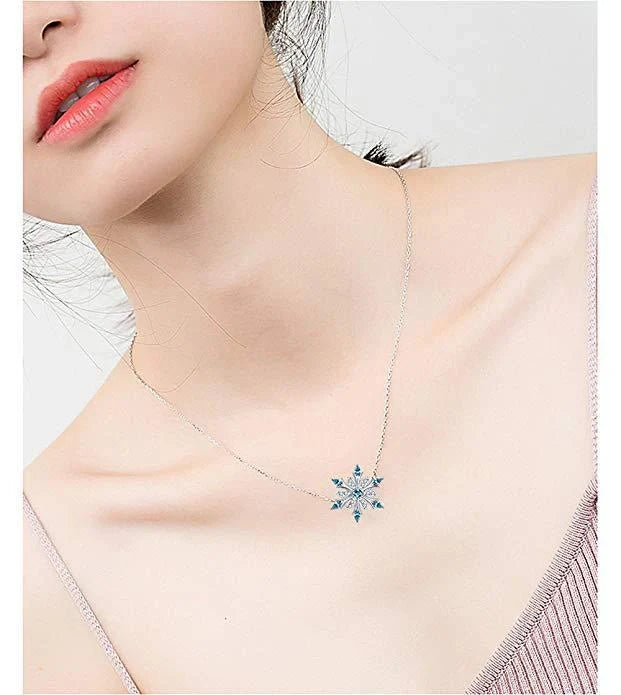 Elegant crystal snowflake pendant necklace with shimmering zircon stones for stylish Christmas celebrations