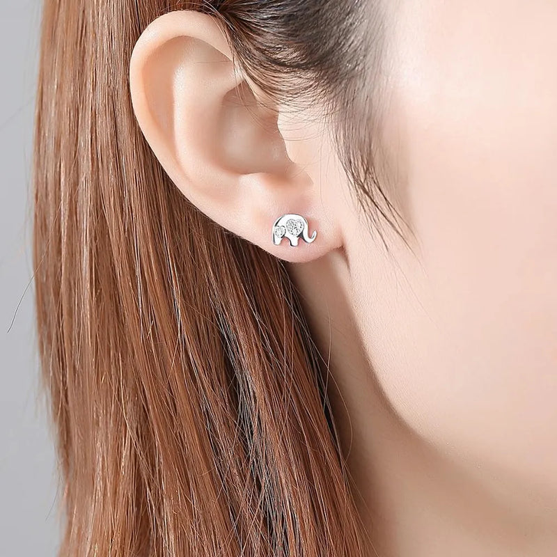 Korean geometric drop earrings made from silver with gemstone accents, measuring 0.6cm wide by 0.9cm long and weighing 1.22g, available in gold and silvery colour finishes for a minimalist statement jewellery look.