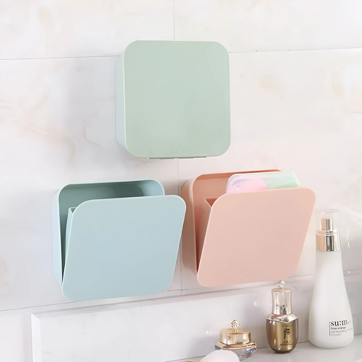 Wall-mounted PP storage box with non-marking stickers in Nordic blue, green, or pink.