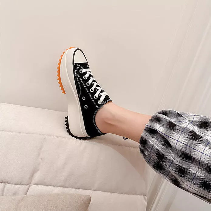 Women's thick-soled canvas shoes in white, black, and black high top options