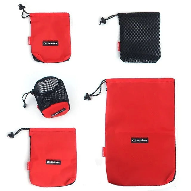 Red five-piece outdoor travel storage bag set with zipper closures and mesh sections