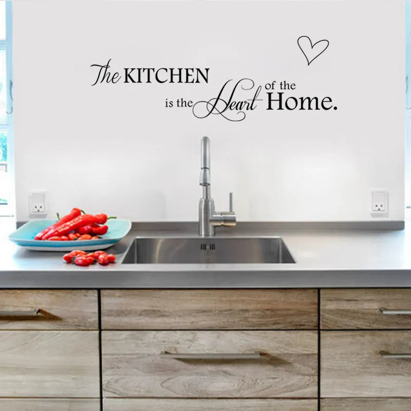 Black 'Kitchen Is Heart Of The Home' PVC wall sticker mural measuring 60x15 cm for removable kitchen decoration
