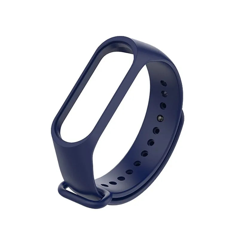 Colourful silicone replacement strap for XIAOMI MI Band 3 smart watch on a wrist.