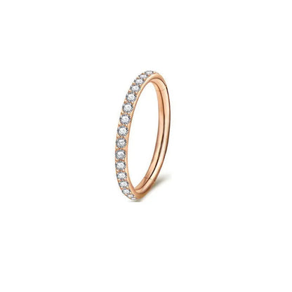 A seamless round hoop nose ring in stainless steel, shown alongside gold and rose gold colour options.