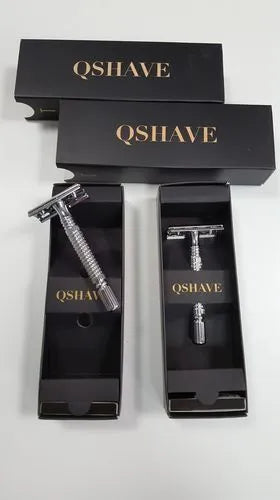 Chrome silver butterfly open double edged safety razor with stainless steel handle on storage box