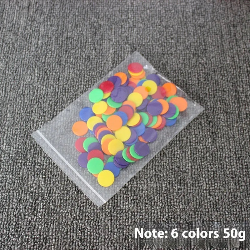 Bag of 100 plastic counting chips in 19mm or 25mm size, solid colour or transparent, for children aged 4 to 6