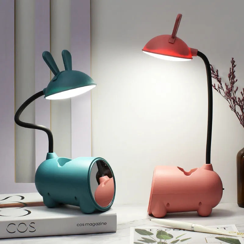 Green desktop table lamp with pen container, measuring 30 cm wide with USB power cable