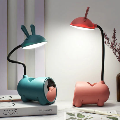 Green desktop table lamp with pen container, measuring 30 cm wide with USB power cable