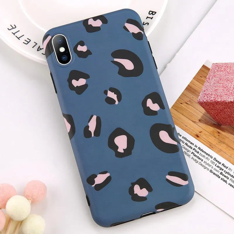 Leopard print protective phone case for iPhone, shown in black, blue, and pink colour options.