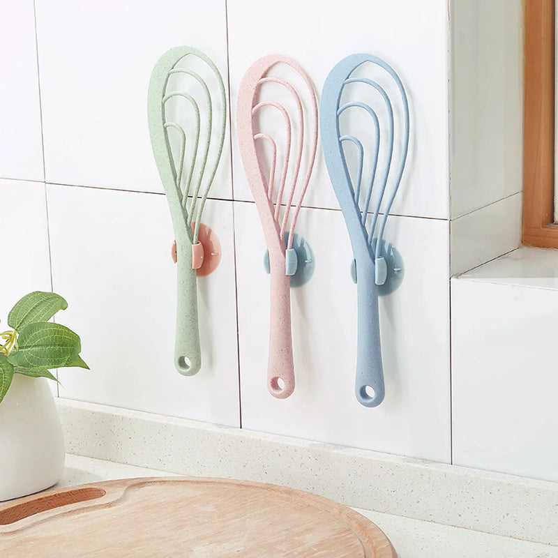 PVC kitchen utensil holder with suction cup base, 2.3cm clamp diameter for storing rice scoops and cooking tools on walls, rice cooker surfaces, and kitchen tiles, available in blue or white colour sent randomly