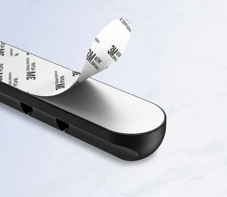 Black silicone USB cable winder for desktop cable management