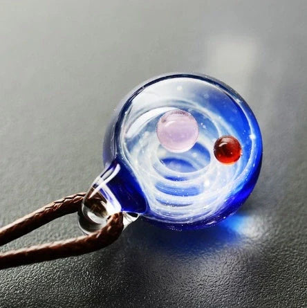 Cosmic Nebula Pendant Necklace featuring a unique blue starry sky design