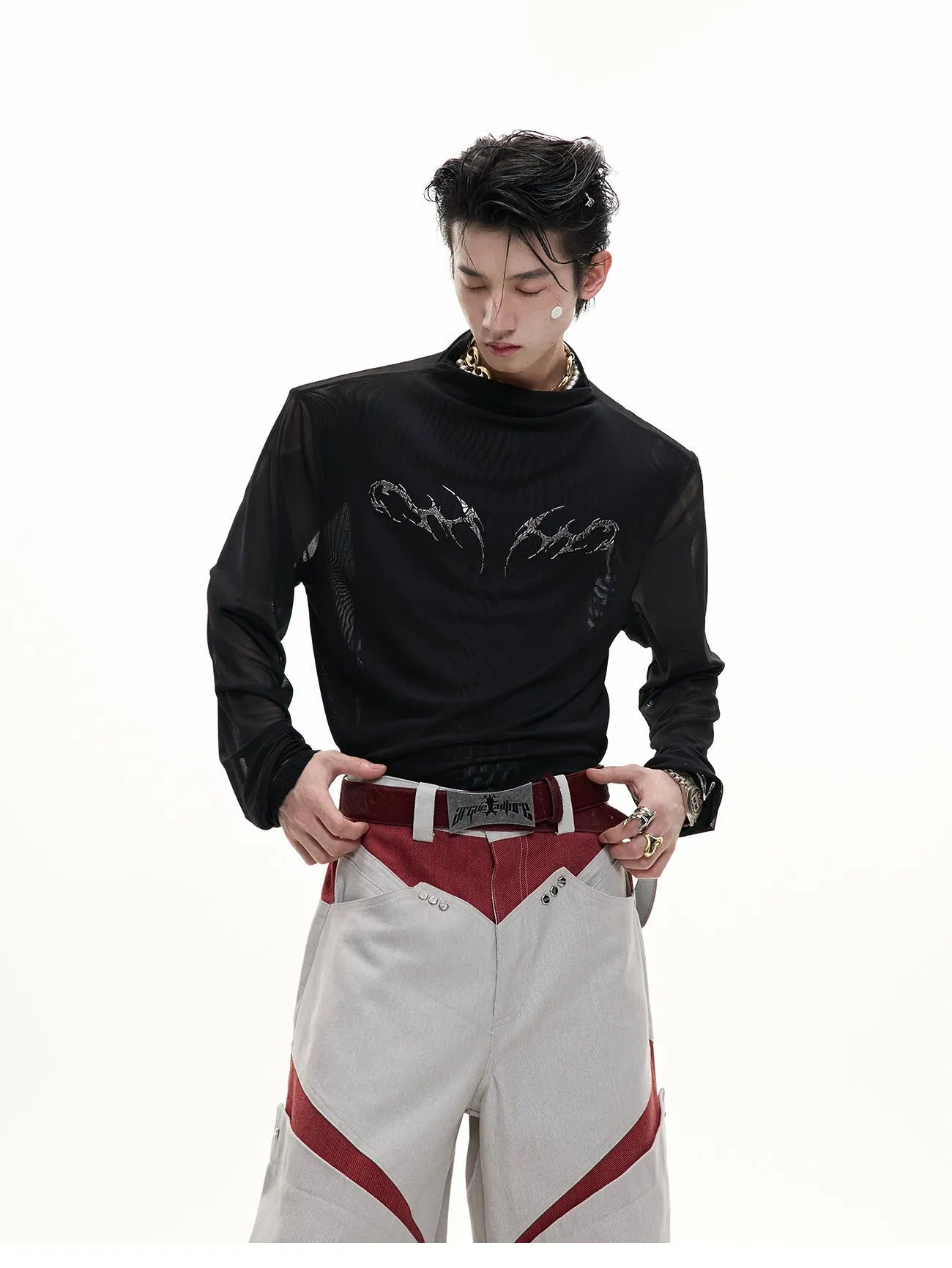 Black and white long sleeve slim fit mesh bottoming shirt laid flat.