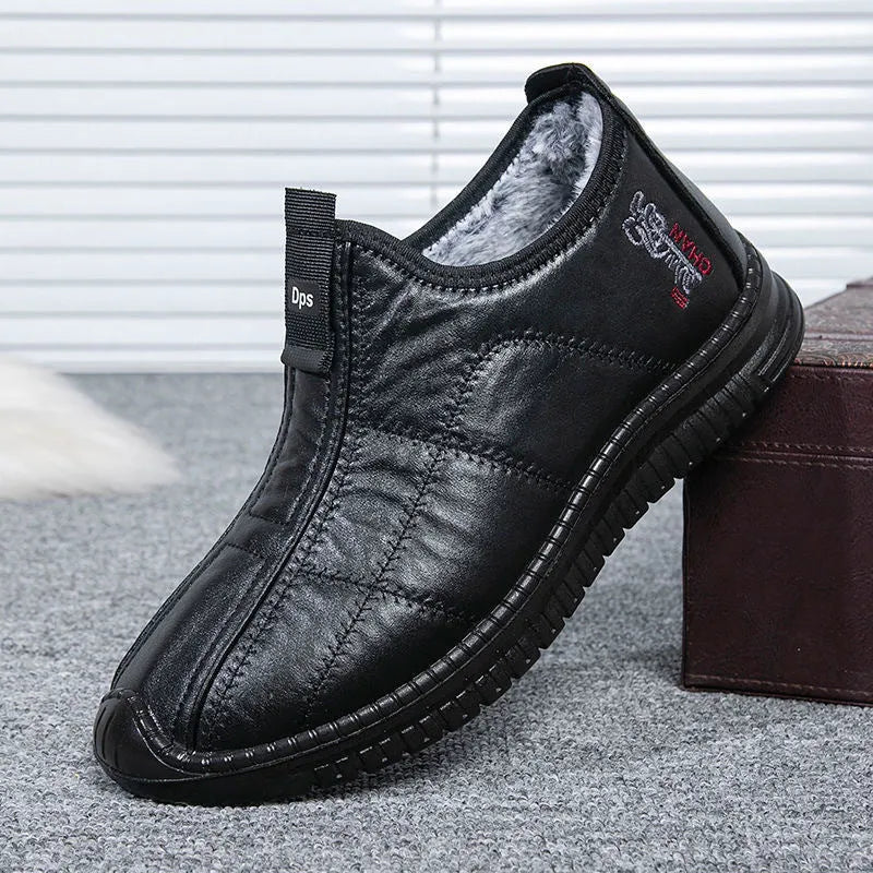 Men's brown casual winter boots with a round toe, buckle closure, and a low-top cotton upper.