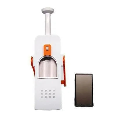 Orange multifunctional vegetable cutter kitchen tool with mandoline blades on a countertop.