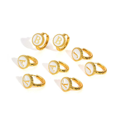 Round gold-tone letter earrings for women in stainless steel with electroplated finish, available in letters A to Z