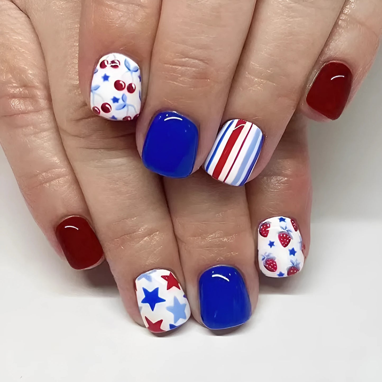 Short glossy red and blue strawberry cherry design press on nail stickers - 24 piece pack