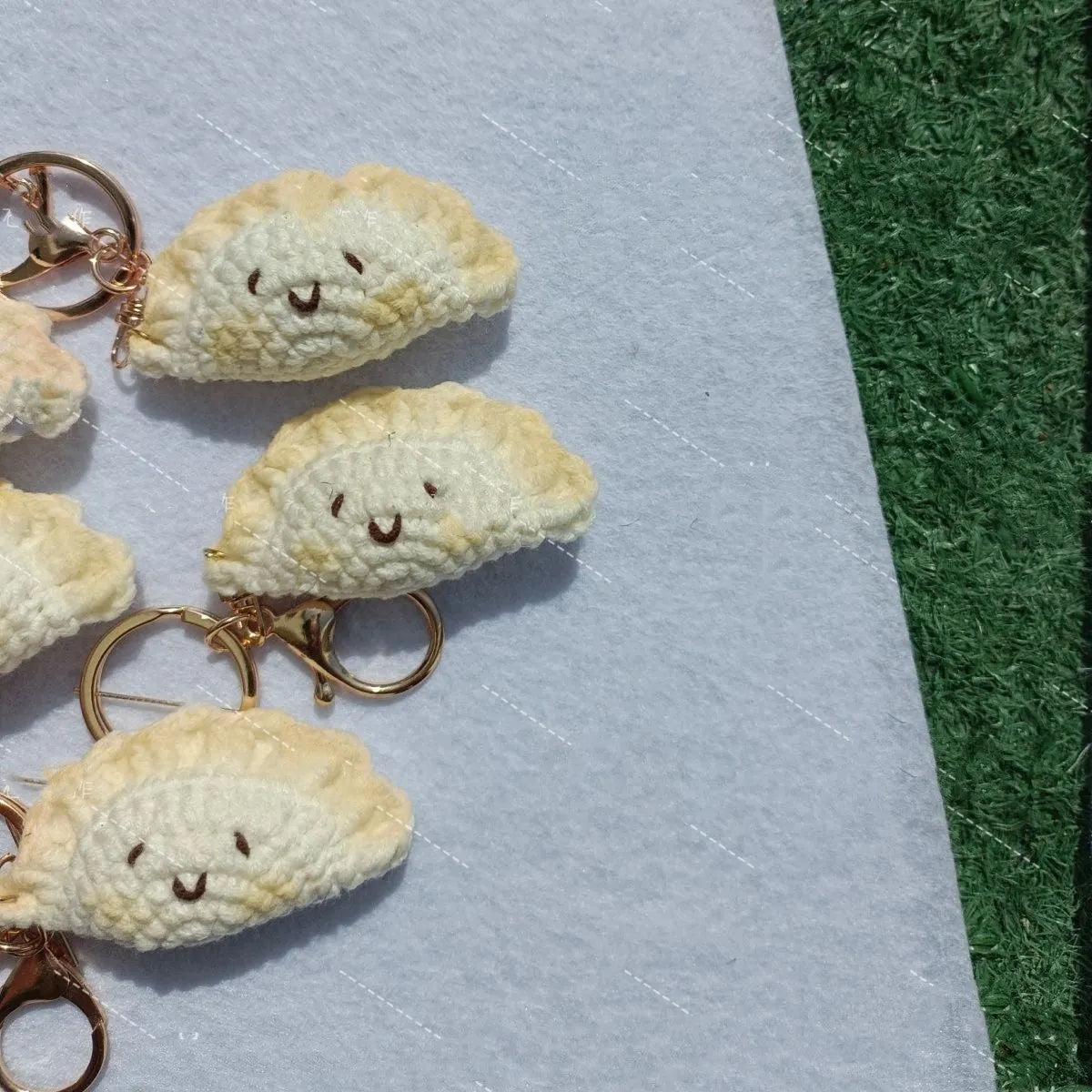 Handmade crochet dumpling pendant with keychain in plush fabric