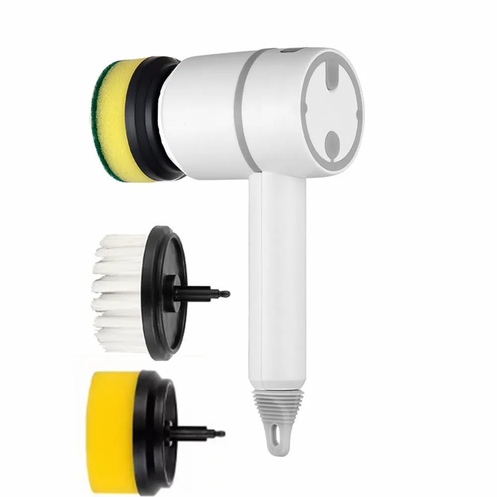 Green electric cleaning brush with multiple brush heads on a kitchen worktop.
