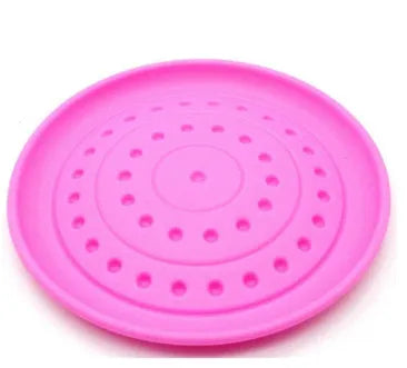 Plastic rubber Frisbee dog toy in green, large size, for outdoor fetch.
