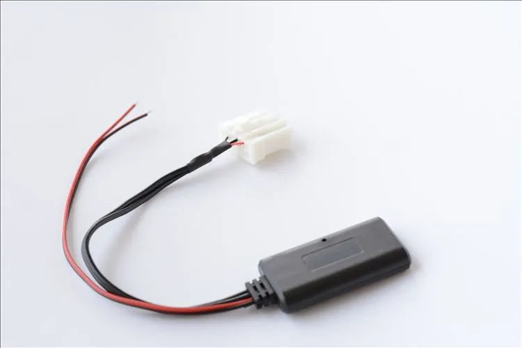 Black JieRui-BT 5908 Bluetooth audio cable for Mazda car models from 2006 onwards.