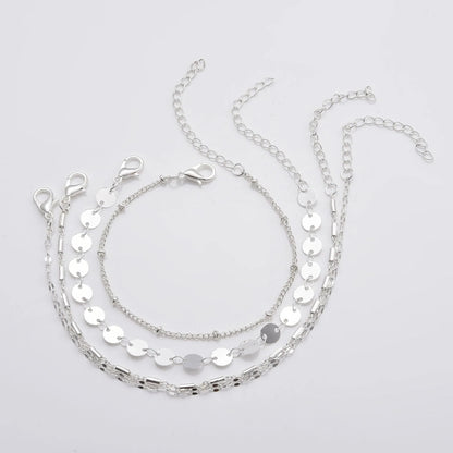 Elegant 4-pack women's chain disc bracelets set in gold and silver