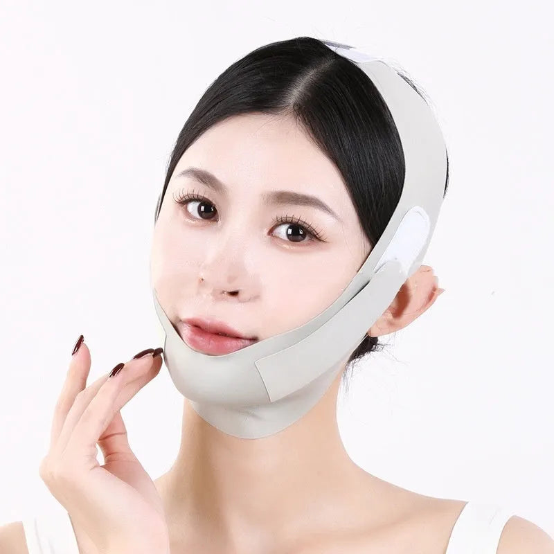 Green and purple breathable fabric V face shaping mask for lifting and tightening.