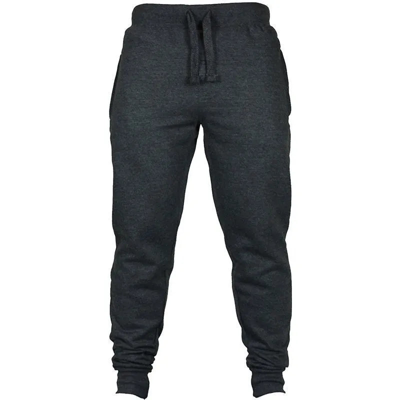 Men's solid colour cotton fleece casual trousers with a drawstring waistband in a loose fit.