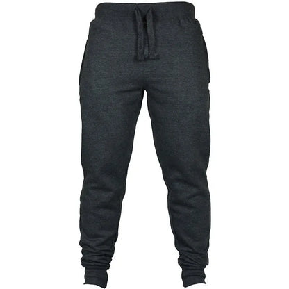 Men's solid colour cotton fleece casual trousers with a drawstring waistband in a loose fit.