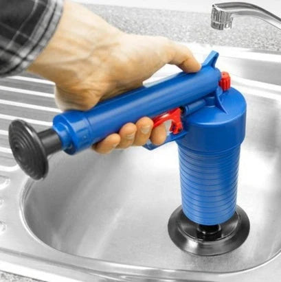 High-powered air pressure drain blaster gun with four different size adapters for clearing clogged pipes, sinks, bathtubs, and floor drains