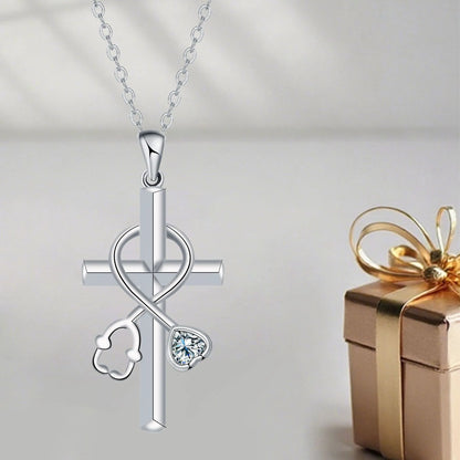 Medical-themed cross necklace with stethoscope pendant on copper chain