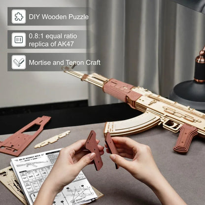 Authentic wooden AK-47 rifle replica with a dark wood grain finish, featuring a detachable magazine and dual firing modes for single-shot and continuous fire