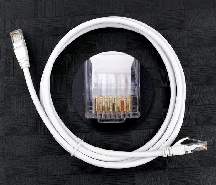 White Cat6 network cable with RJ-45 connectors and CCA conductors, available in lengths from 1M to 50M