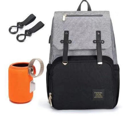 Stylish and functional diaper backpack with large capacity, stroller hooks, and USB charging port for modern parents